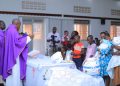 Children who were born prematurely receive a blessing during Mass led Fr. Surivenus Nungwa the Archdiocese of Mbarara Vicar General as Holy innocents children's hospital celebrates World Prematurity Day