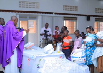 Children who were born prematurely receive a blessing during Mass led Fr. Surivenus Nungwa the Archdiocese of Mbarara Vicar General as Holy innocents children's hospital celebrates World Prematurity Day