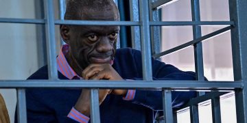 Minister Baryomunsi Calls for Besigye’s Release on Bail