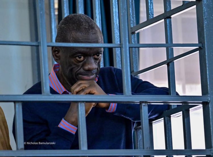 Minister Baryomunsi Calls for Besigye’s Release on Bail