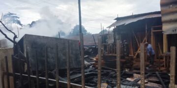 Fire Guts timber building in seeta near Mogas Petro station