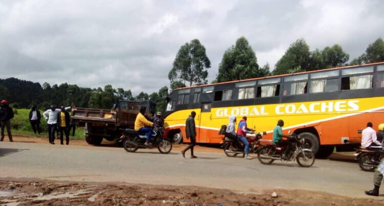 Two Injured in Global Bus Crash, Driver Flees